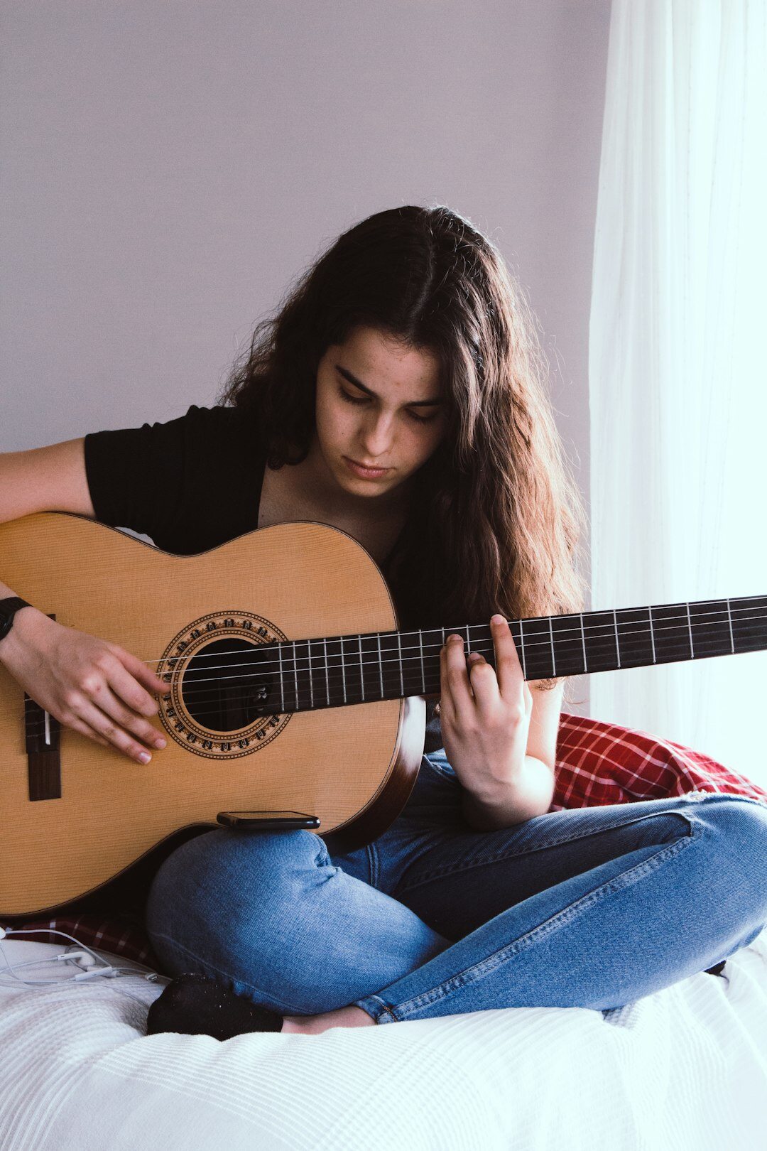 musician practicing guitar